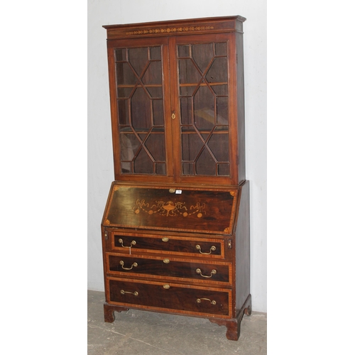 73 - A large antique Sheraton Revival inlaid bureau bookcase with astral glazed top and 3 drawer base, ap... 