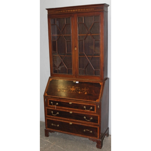 73 - A large antique Sheraton Revival inlaid bureau bookcase with astral glazed top and 3 drawer base, ap... 