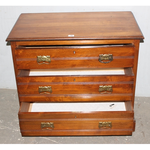 74 - An early 20th century mahogany 3 drawer chest of drawers with Art Nouveau brass handles, approx 91cm... 