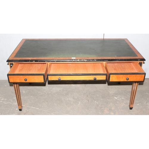 76 - A decorative Art Deco style 3 drawer light wood and ebonised desk with leather inset top, approx 150... 