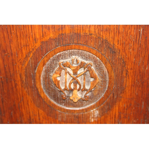 47 - A 19th century carved oak hall chair