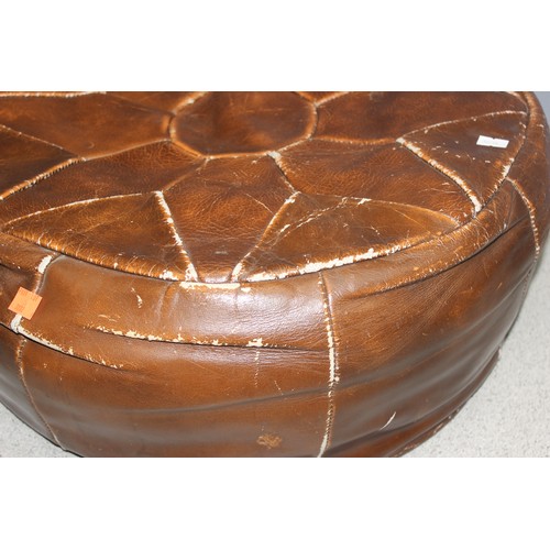 128 - Vintage leather footstool or pouffe, approx 53cm wide x 19cm tall