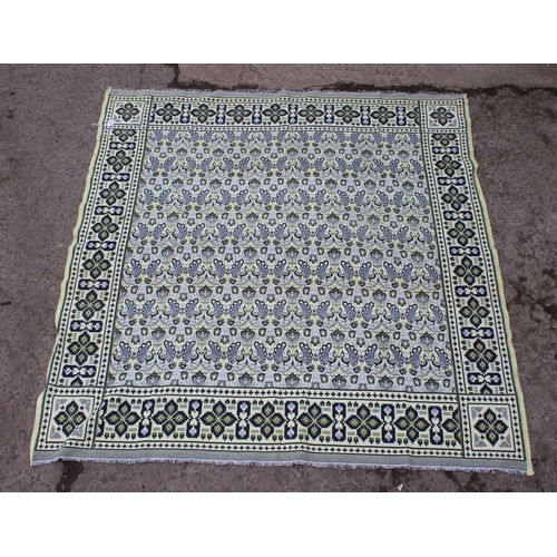 218 - A large reversible fabric blanket or throw decorated with peacocks, approx 218cm wide x 220cm deep