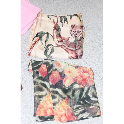 219 - Qty of assorted fabric scarves