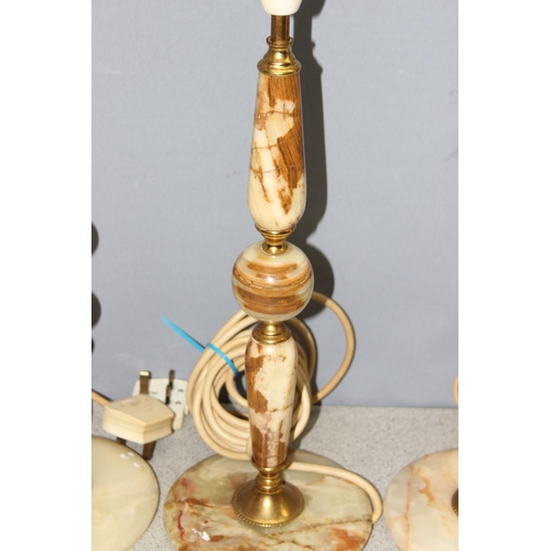 258 - 4 assorted vintage onyx and gilt metal table lamps, the largest approx 58cm tall