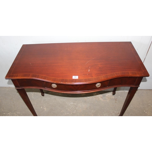 91 - Mahogany serpentine hall table with single drawer, approx 108cm wide x 50cm deep x 84cm tall