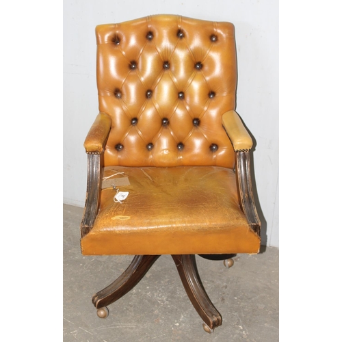 97 - A light brown Chesterfield button desk or captain's chair, approx 60cm wide x 56cm deep x 103cm tall