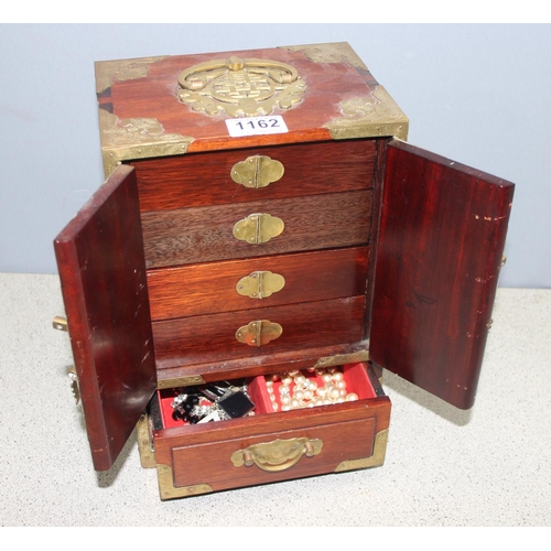 1162 - Oriental style wooden jewellery box with some contents to include silver, approx 21cm W x 15cm D x 3... 