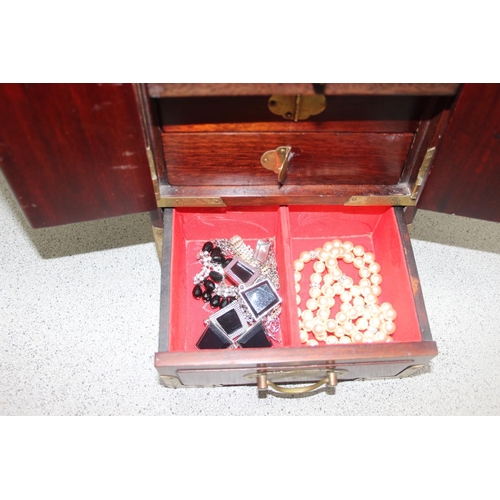 1162 - Oriental style wooden jewellery box with some contents to include silver, approx 21cm W x 15cm D x 3... 