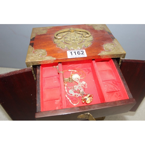 1162 - Oriental style wooden jewellery box with some contents to include silver, approx 21cm W x 15cm D x 3... 