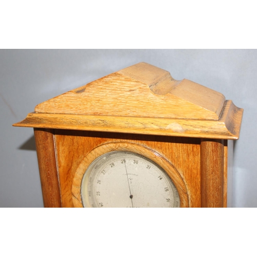 1307 - Antique barometer by J. Hicks of London mounted in light oak clock-case, approx 29cm H