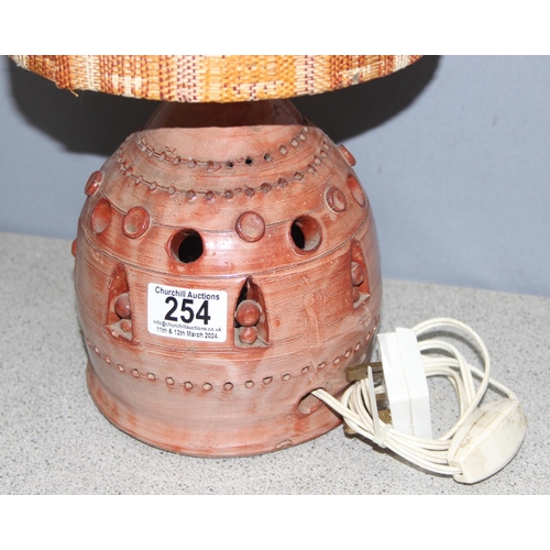 254 - Glazed studio pottery lamp with retro woven shade, approx 47cm H
