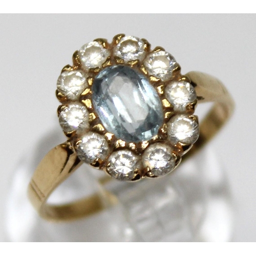 1156 - An 18ct gold white and light blue stone cluster ring, marked 750 & XRF confirmed, approx size P, app... 