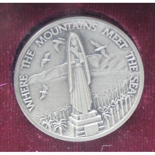 1204 - A set of 4 Santa Monica 1975 centennial commemorative medallions, 2 made from pure .999 silver and 2... 