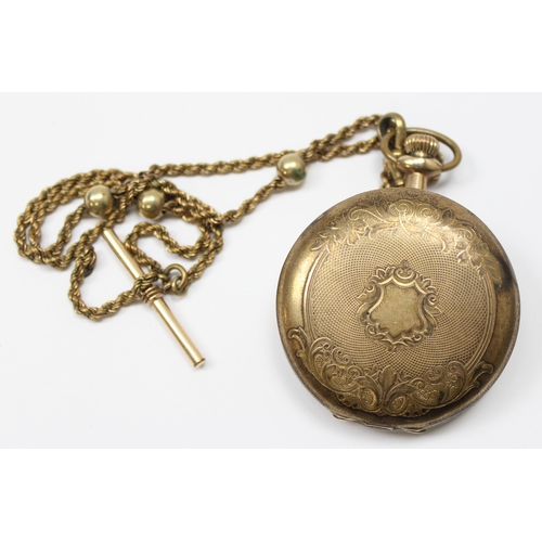 1302 - Vintage gold plated Trans-Pacific full hunter pocket watch with a gold plated Albert chain