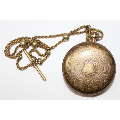 1302 - Vintage gold plated Trans-Pacific full hunter pocket watch with a gold plated Albert chain