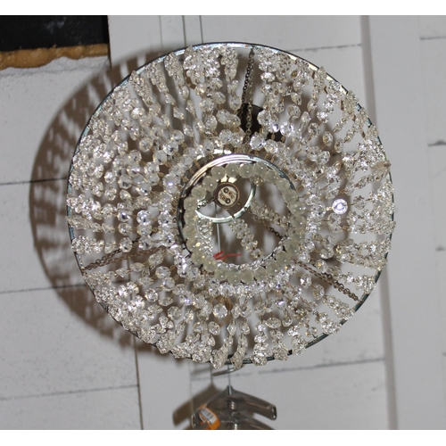 247 - Vintage brass hanging lantern with hammered-meta effect glazed panel approx 30cm H