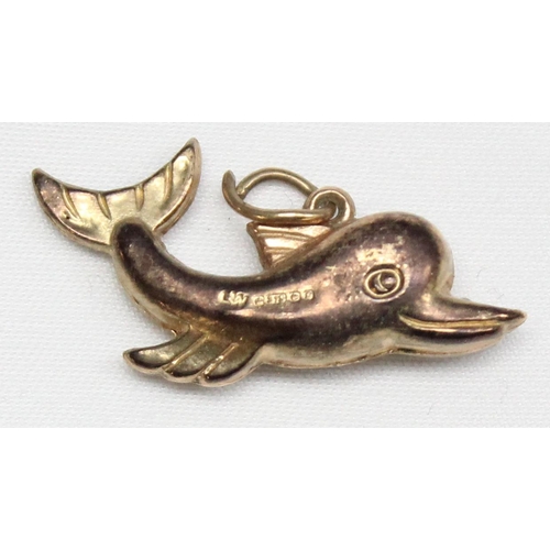 1166 - 9ct gold charm or pendant formed as a dolphin, marked and XRF confirmed, approx 1.11g gross