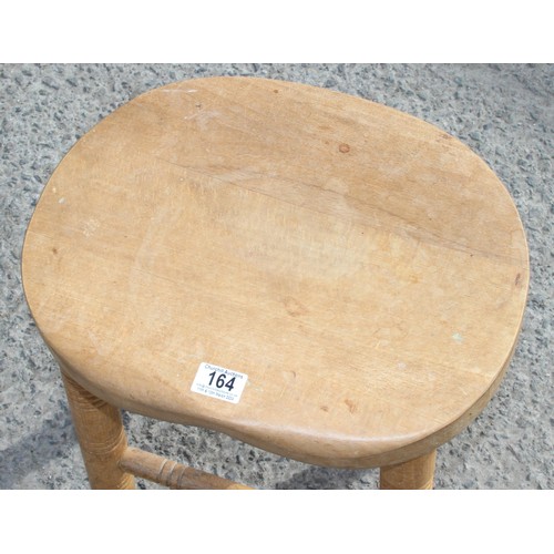 32 - A vintage heavy light wood stool with turned legs, approx 53cm tall