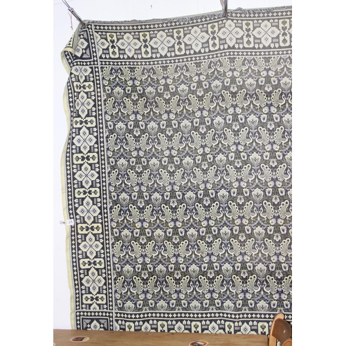 218 - A large reversible fabric blanket or throw decorated with peacocks, approx 218cm wide x 220cm deep