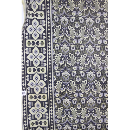 218 - A large reversible fabric blanket or throw decorated with peacocks, approx 218cm wide x 220cm deep