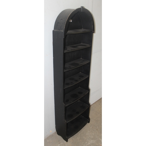 10 - A small vintage black painted waterfall bookcase, approx 55cm wide x 18cm deep x 175cm tall