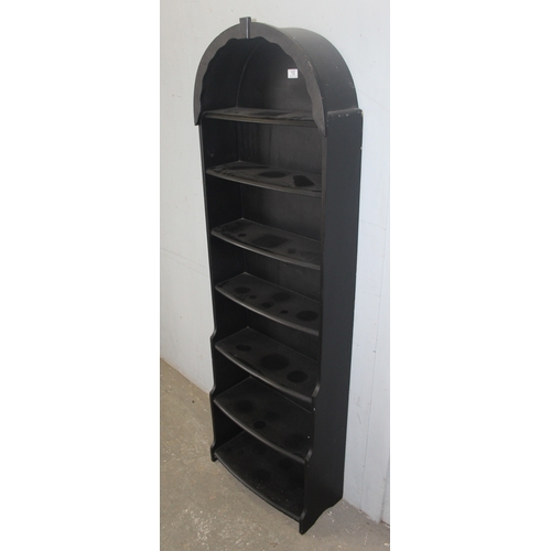 10 - A small vintage black painted waterfall bookcase, approx 55cm wide x 18cm deep x 175cm tall