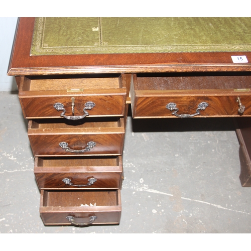 15 - A vintage mahogany pedestal desk with green gilt tooled leather top, approx 120cm wide x 60cm deep x... 