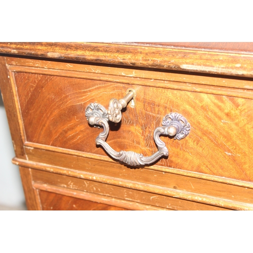 15 - A vintage mahogany pedestal desk with green gilt tooled leather top, approx 120cm wide x 60cm deep x... 