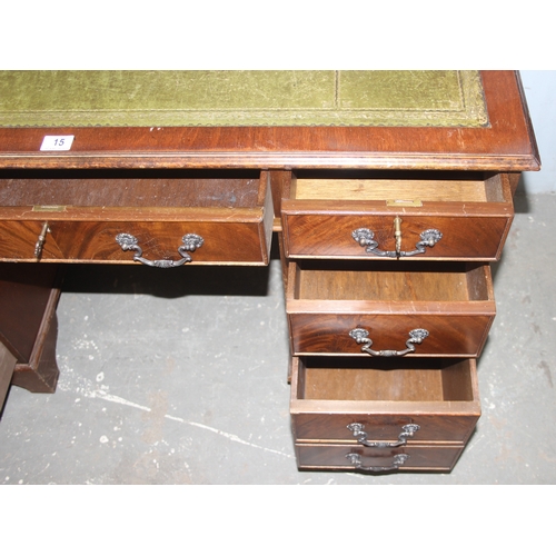 15 - A vintage mahogany pedestal desk with green gilt tooled leather top, approx 120cm wide x 60cm deep x... 