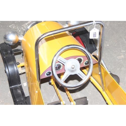 1500 - A vintage style metal child's pedal car, approx 110cm long, yellow painted like Brum