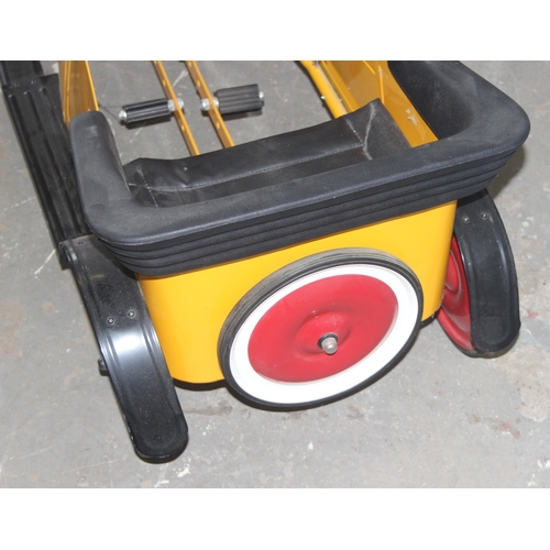 1500 - A vintage style metal child's pedal car, approx 110cm long, yellow painted like Brum