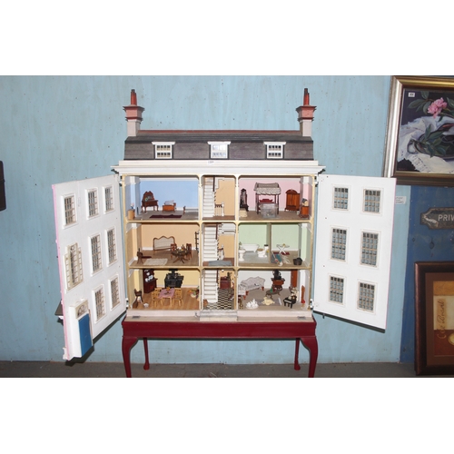 1501 - Brian Stone of Wallingford - a very large bespoke made dolls house on stand formed as a Georgian tow... 