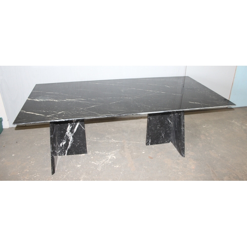 28 - An extremely large black figured marble table with matching base, the top approx 200cm x 100cm