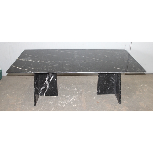 28 - An extremely large black figured marble table with matching base, the top approx 200cm x 100cm