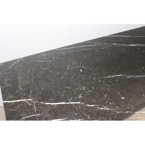 28 - An extremely large black figured marble table with matching base, the top approx 200cm x 100cm