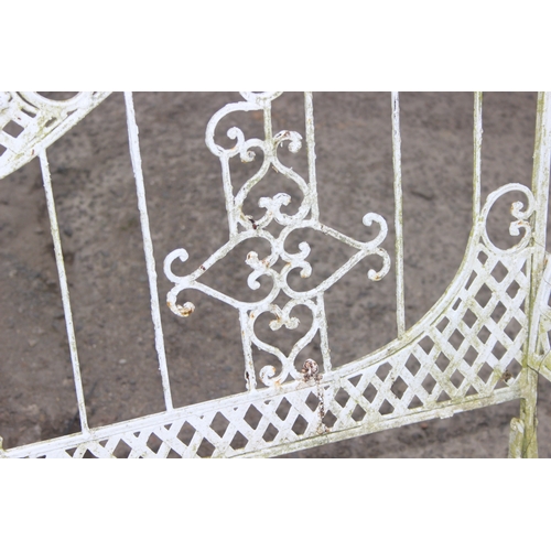 303 - A vintage white painted French style iron garden bench, approx 140cm wide x 105cm tall