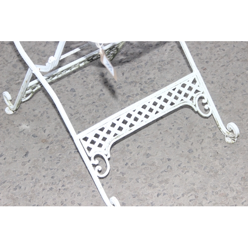 305 - A vintage white painted French style iron garden table, approx 85cm wide x 53cm deep x 60cm tall