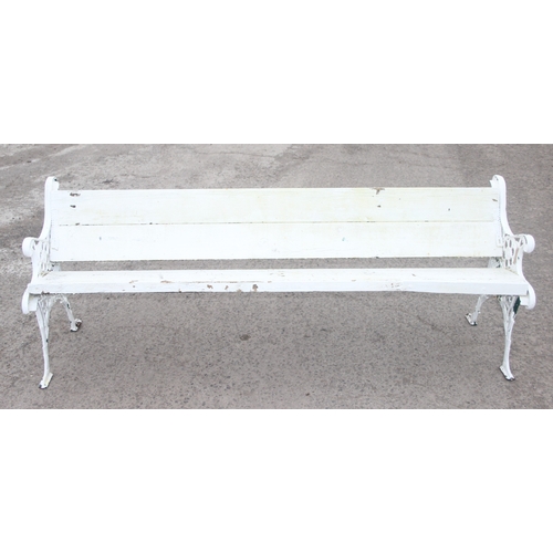 308 - A long white painted wooden and cast iron garden bench, approx 200cm wide x 63cm deep x 73cm tall