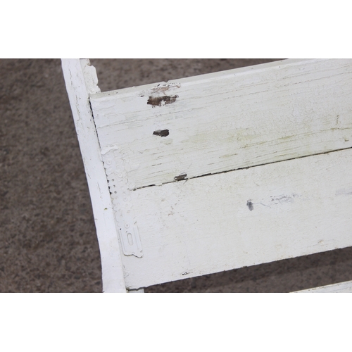 308 - A long white painted wooden and cast iron garden bench, approx 200cm wide x 63cm deep x 73cm tall