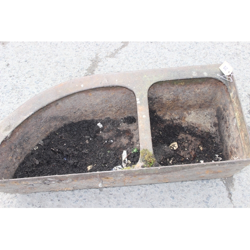 315 - A large vintage cast iron feeder planter, approx 98cm wide x 40cm deep x 32cm tall