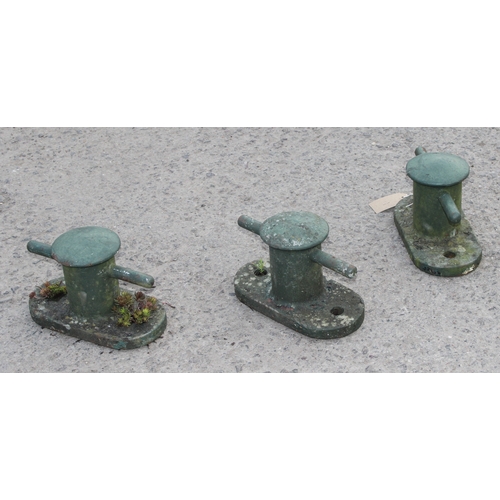 319 - A set of 3 green painted cast iron boat mooring cleats, each approx 28cm wide