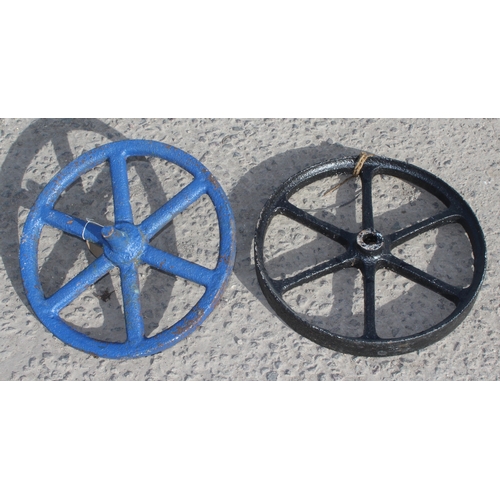 320 - A pair of vintage painted cast iron barrow or cart wheels, each approx 47cm wide x 47cm deep