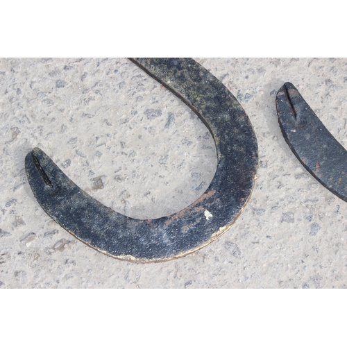 321 - A pair of antique cast iron S shaped anchor plates or wall tie brackets, each approx 69cm tall