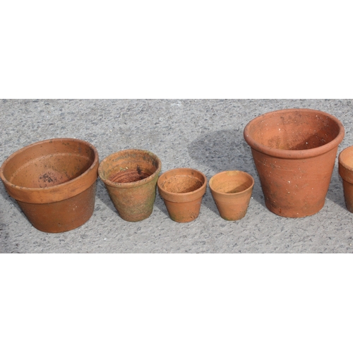 327 - 12 assorted terracotta garden planter pots, largest approx 36cm wide x 36cm deep x 23cm tall