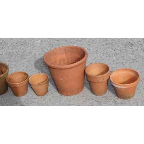 327 - 12 assorted terracotta garden planter pots, largest approx 36cm wide x 36cm deep x 23cm tall