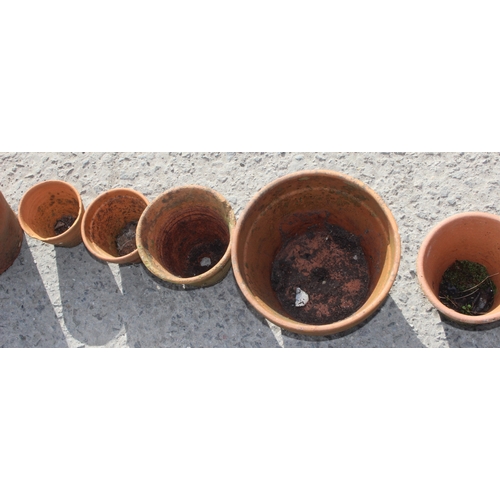 327 - 12 assorted terracotta garden planter pots, largest approx 36cm wide x 36cm deep x 23cm tall