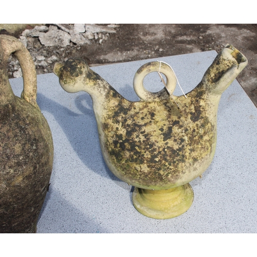 335 - 2 unusual weathered terracotta water vessels or jugs, tallest approx 38cm tall