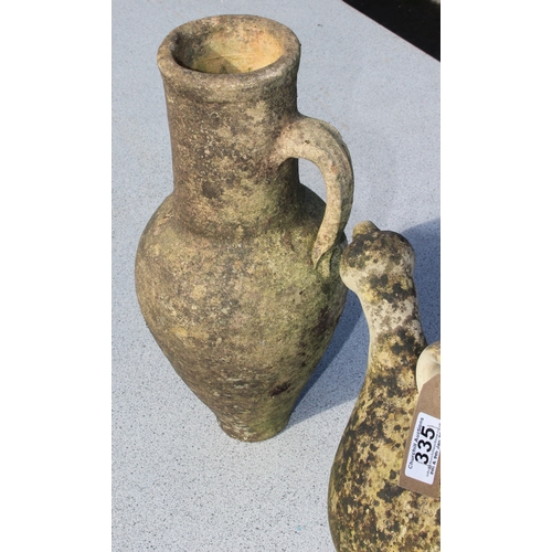 335 - 2 unusual weathered terracotta water vessels or jugs, tallest approx 38cm tall