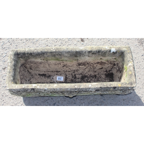 336 - A large weathered concrete garden trough planter, approx 69cm wide x 25cm deep x 25cm tall